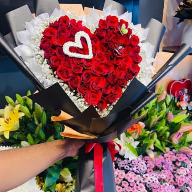 Heart-Shaped Red Rose Bouquet with Baby's Breath